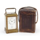 French brass cased repeating carriage clock with leather travelling case by François-Arsene