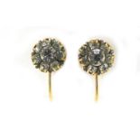 Pair of unmarked gold clear stone earrings (tests as 9ct gold), 6mm in diameter, 1.2g :For Further