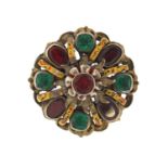 Antique unmarked white metal enamelled brooch, set with garnets and green stones, 2.6cm in diameter,