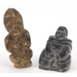 Canadian Inuit stone carving of an Eskimo and a South American stone carving of a figure, the