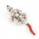 Victorian style unmarked silver babies rattle with whistle and coral handle, 14cm in length :For
