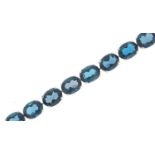 9ct white gold blue stone bracelet, 18cm in length, 21.6g :For Further Condition Reports Please