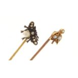 Two Victorian unmarked gold tie pins including a fly with pearl body and set with diamonds, each