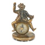 Gilt metal and agate compass fob in the form of a merry gentleman, 3cm high :For Further Condition