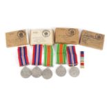 Five British military World War II medals, four with boxes of issue :For Further Condition Reports