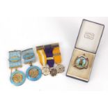 Six silver and enamel medals and a brooch including Past Chairman, Polegate Town Council,
