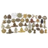 British military World War I cap badges including Essex Regiment, Royal Air Force, Hampshire, The