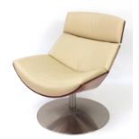 Contemporary bentwood and leather swivel lounge chair, 92cm high :For Further Condition Reports