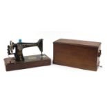 Victorian Singer sewing machine with case, decorated with flowers, numbered F7607487 :For Further