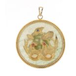 Chinese gilt metal and jade pendant depicting two birds, set with semi precious stones, 4.5cm in