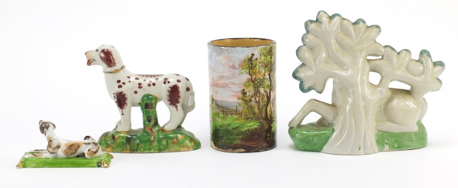 Three Staffordshire style animals and a cylindrical pot hand painted with a fisherman, the largest - Image 4 of 8