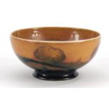 William Moorcroft pottery footed bowl hand painted in the Eventide pattern, 13cm in diameter :For