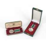 Two Women's Voluntary Service medals with cases :For Further Condition Reports Please Visit Our