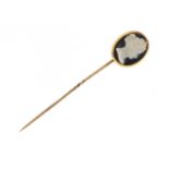 Victorian unmarked gold cameo glass tie pin, 8cm in length, housed in a velvet and silk lined tooled