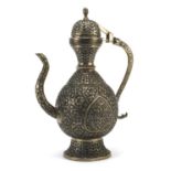 Indian silver coloured metal wine ewer embossed and engraved with flowers, 36cm high :For Further