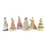 Six Wedgwood figurines including Christmas at Windsor, The Royal Wedding and The Coronation Ball,