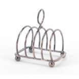 George VI silver four slice toast rack, by Atkin Brothers, Sheffield 1942, 8cm wide, 68.6g :For