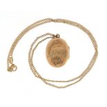9ct gold locket, 2.5cm in length on a 9ct gold necklace, 42cm in length, 5.0g :For Further Condition
