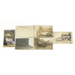 Five early 20th century black and white photographic postcards and one other including J Sainsbury