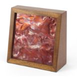 Arts & Crafts William de Morgan ruby lustre tile with lion motifs, housed in a mahogany frame,