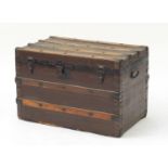 Vintage wooden bound travelling trunk with carrying handles, Whites Store label to the interior,