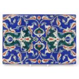 Rectangular Turkish Iznik tile fragment, hand painted with flowers, 24cm x 16.5cm :For Further