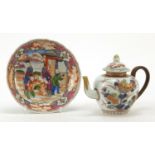 Chinese porcelain teapot and a saucer hand painted in the Mandarin palette with figures, the largest