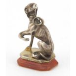 Victorian unmarked silver and carnelian seated dog fob, 3.5cm high, 14.0g :For Further Condition