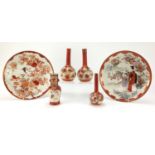 Japanese Kutani porcelain comprising two plates and four vases, the largest each 31cm in diameter :