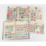World stamps including Great Britain, China and Germany arranged in four albums :For Further