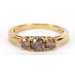 9ct gold brown diamond three stone ring, size O, 2.3g :For Further Condition Reports Please Visit