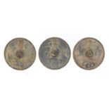 Three Chinese Archaic style bronzed buttons each 5cm in diameter :For Further Condition Reports