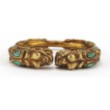 Tibetan gilt metal dragon bangle set with turquoise and coral, 8cm in diameter :For Further
