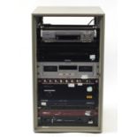 Stage audio equipment including Bose 1600 series VI professional amplifier, Denon five disc CD