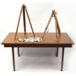 1970's Uniflex teak table, two folding artist's easels and a selection of paint used by Alfred