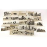 Twenty two German military black and white photographs, one signed Luce, including tanks and