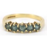 18ct gold green stone half eternity ring, size R, 4.2g :For Further Condition Reports Please Visit