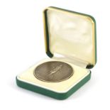 London 1934 International Air Post Exhibition silver medallion engraved R E R Dalwich, 5cm in