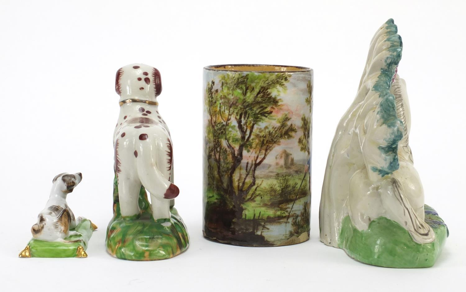 Three Staffordshire style animals and a cylindrical pot hand painted with a fisherman, the largest - Image 5 of 8