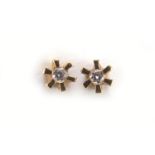 Pair of unmarked gold diamond solitaire earrings, 4mm in diameter, 1.0g :For Further Condition