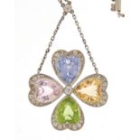 Unmarked white metal, multi gem four leaf clover necklace, set with diamonds, sapphire, peridot,