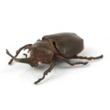 Japanese patinated bronze rhino horn beetle with articulated wings, 9.5cm in length :For Further