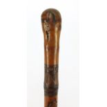 Chinese bamboo walking stick carved with warriors, 92cm in length :For Further Condition Reports
