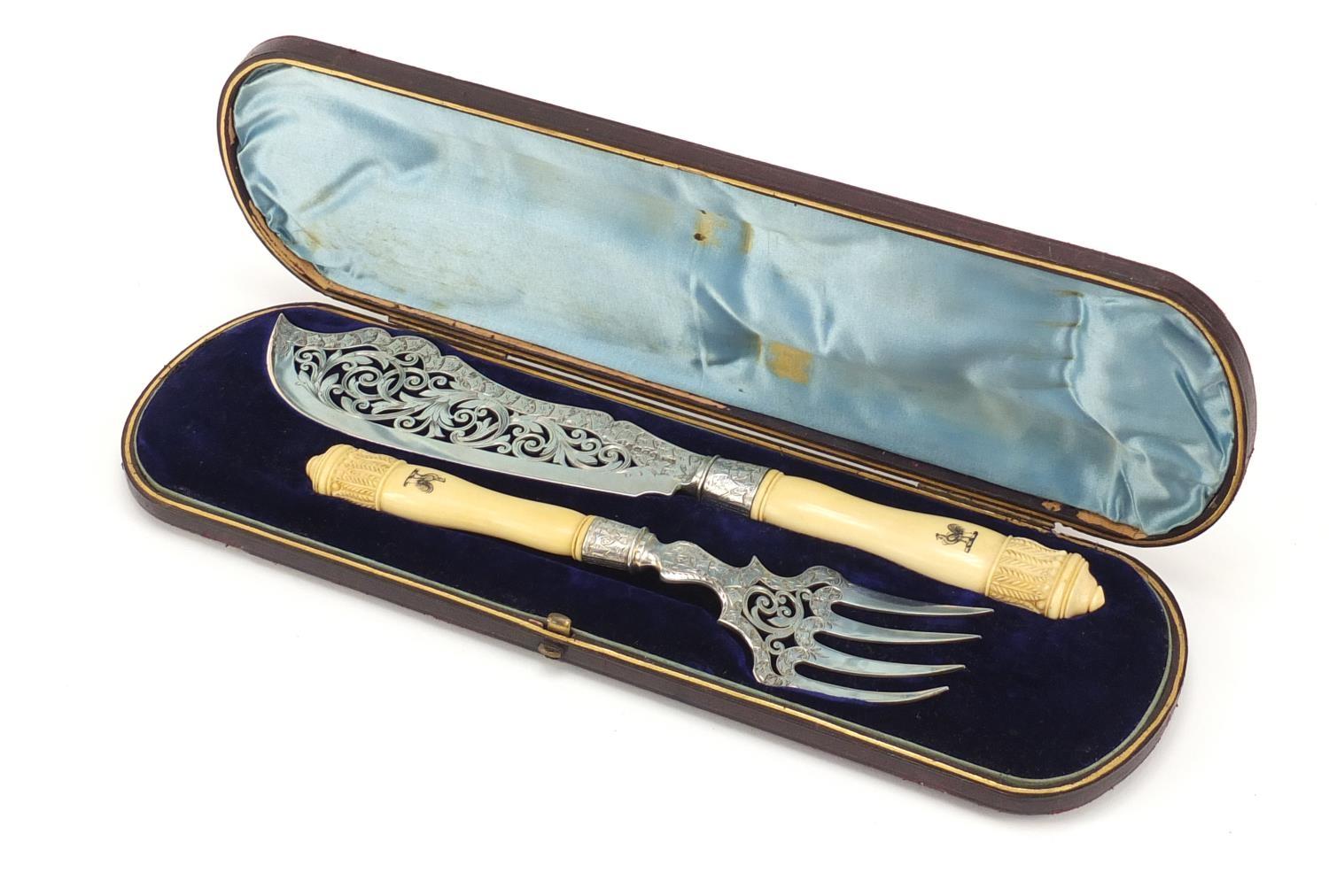 Victorian silver and ivory fish servers by George Unite, Birmingham 1884, 29cm in length, housed