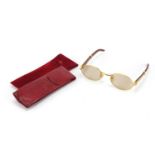Pair of Cartier sunglasses made for Liberty with case dated 1990, serial number 1311528 :For Further