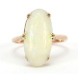 Unmarked gold Cabochon opal ring, (tests as 9ct gold) size L, 3.0g :For Further Condition Reports