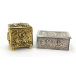 Antique brass tobacco box decorated in relief with monkeys and a silvered casket decorated with
