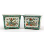 Pair of Chinese porcelain planters, each hand painted in the famille rose palette with panels of