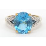9ct gold blue topaz and diamond ring, size P, 3.7g :For Further Condition Reports Please Visit Our