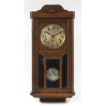 Oak cased Westminster chiming wall clock with bevelled glass, 80cm high :For Further Condition